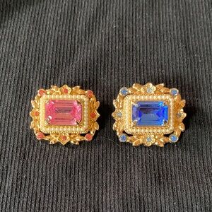 2 vintage gold-tone Coro brooches with emerald-cut blue and pink rhinestone